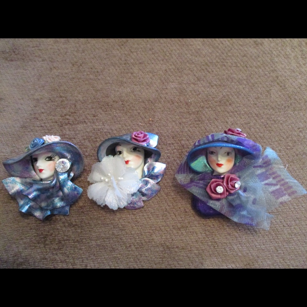 3 female brooches